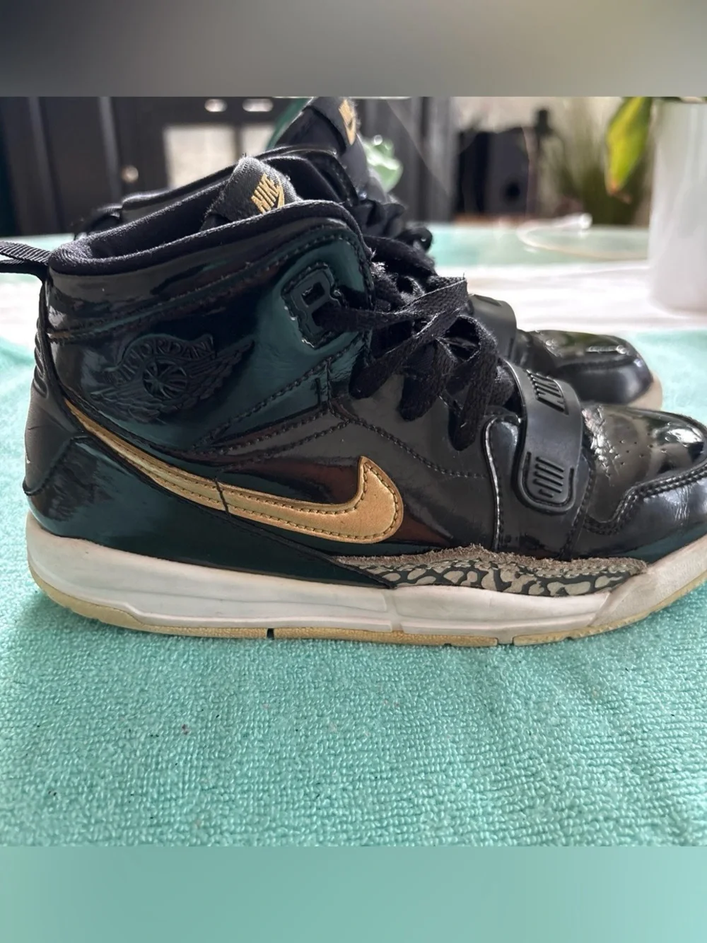 Nike Kids' High-Top Sneaker - Black with Gold Swoosh